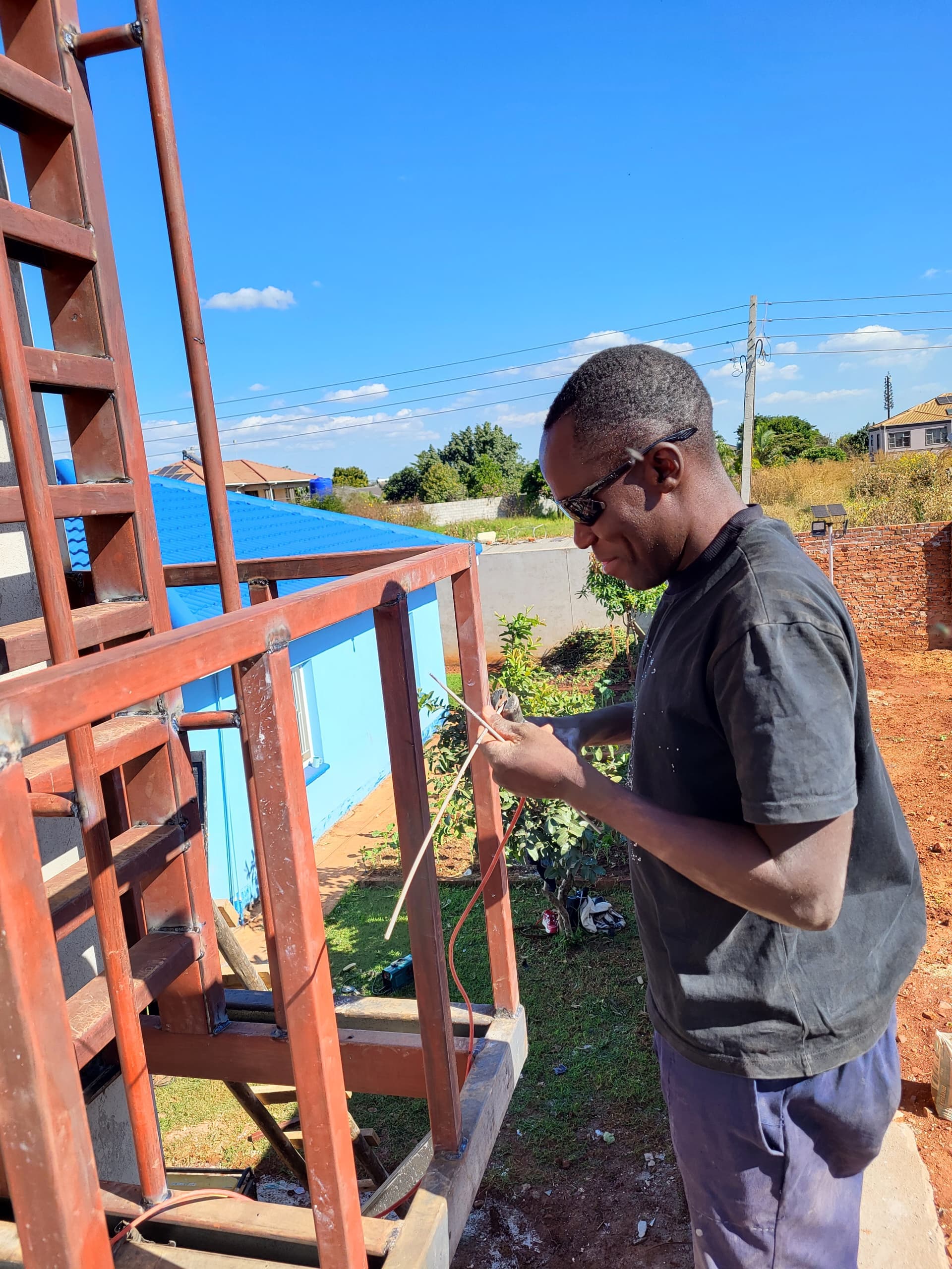 Daniel Muronzi, founder of Mroncy School of Welding, at work