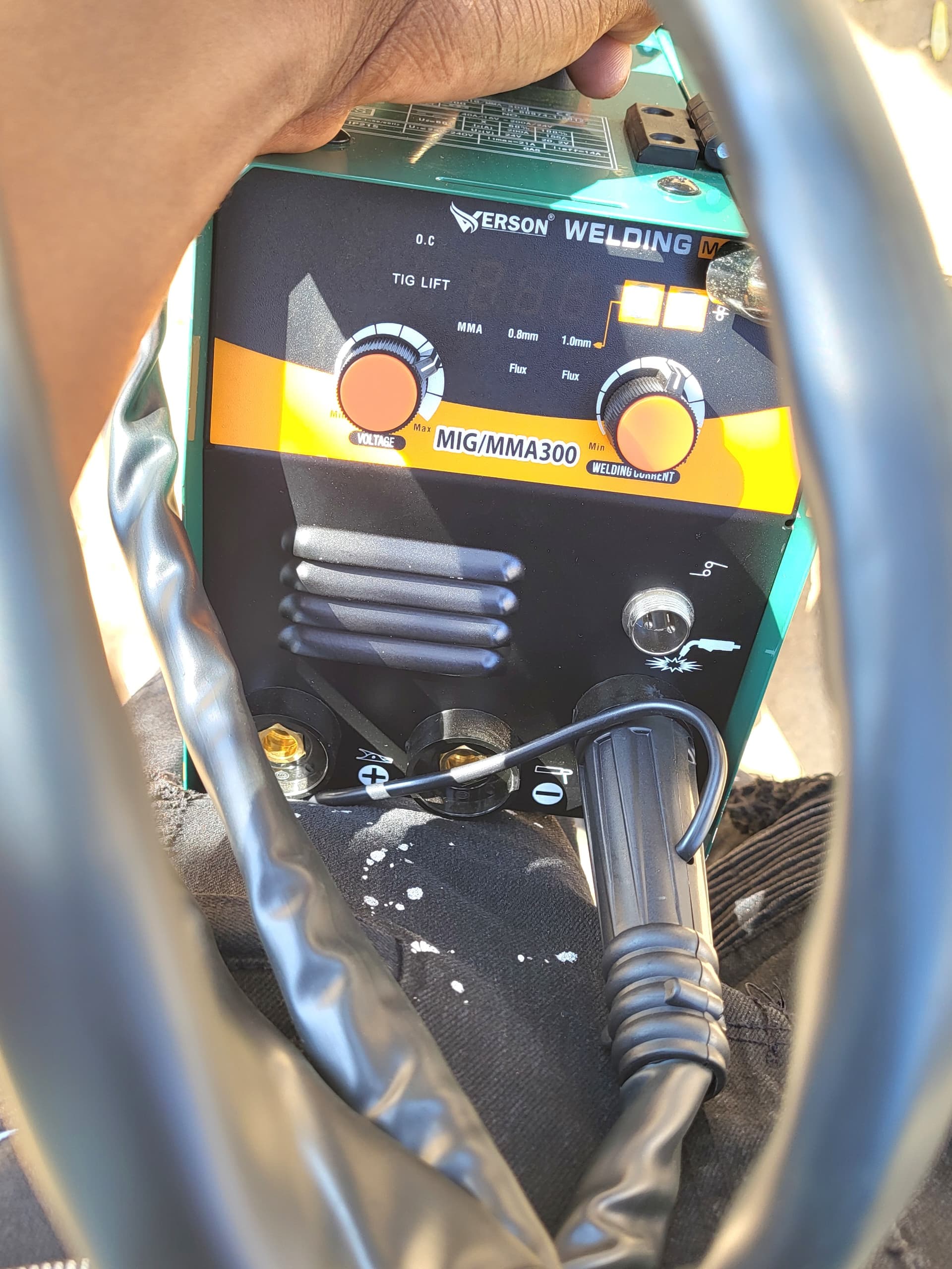 Close-up of VERSON welding machine controls